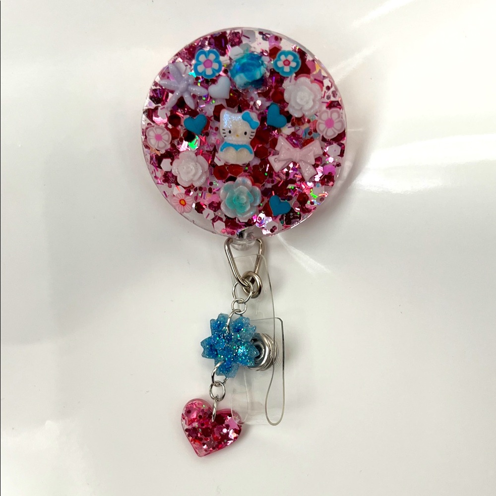 New Hellokitty Pink and Blue Floral Badge Reel with cute charms